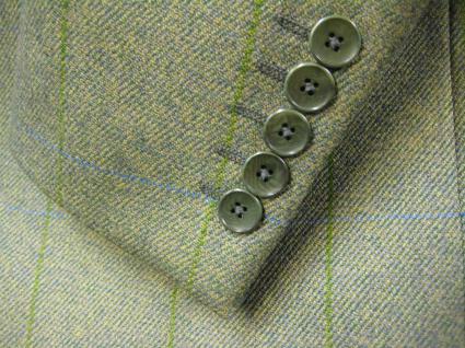 Green tweed three-piece wedding suit