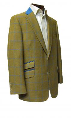 Made to measure tweed jacket with blue collar and trim