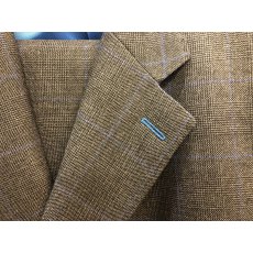 Prince of Wales dark check suit in medium weight British wool with pale blue details