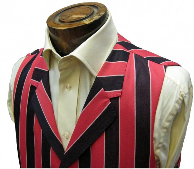 Red black and white three piece suit with collared waistcoat