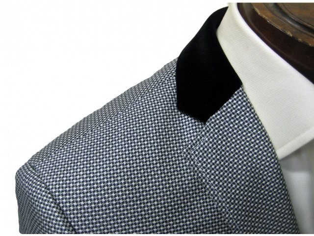 Black and white tweed jacket with velvet collar